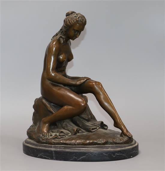 After Allegrain. A bronze statue of a seated nude. height 31cm